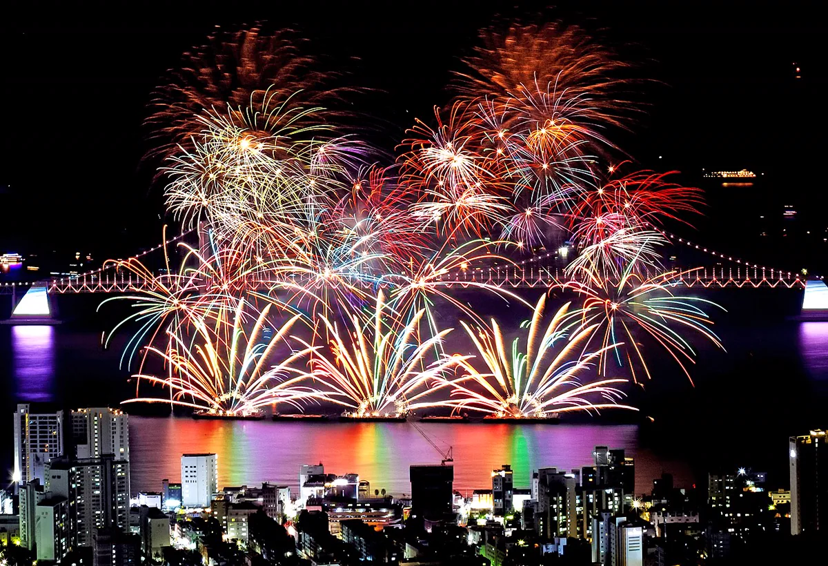 Fireworks bursting over Gwangan Bridge and the Busan waterfront
